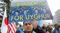 Dramático del pueblo uigur en Xinjiang, China.