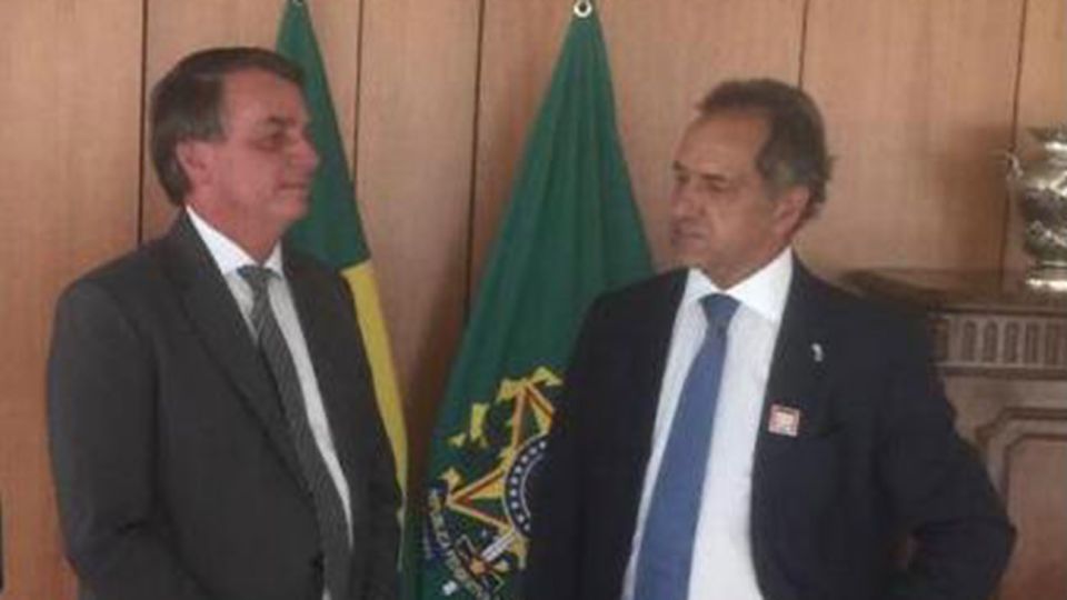 Jair Bolsonaro y el embajador Daniel Scioli en el Palacio del Planalto 20210113