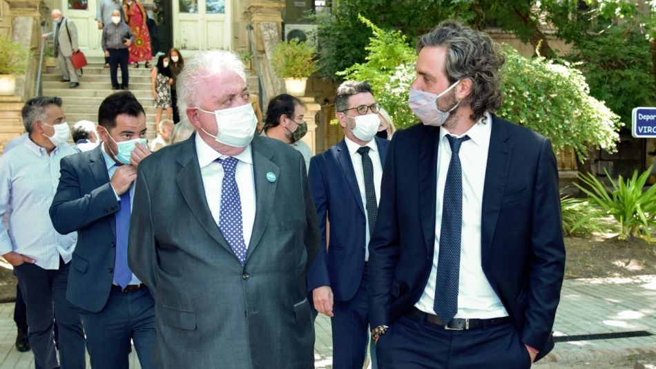 Ginés González García junto a Santiago Cafiero.