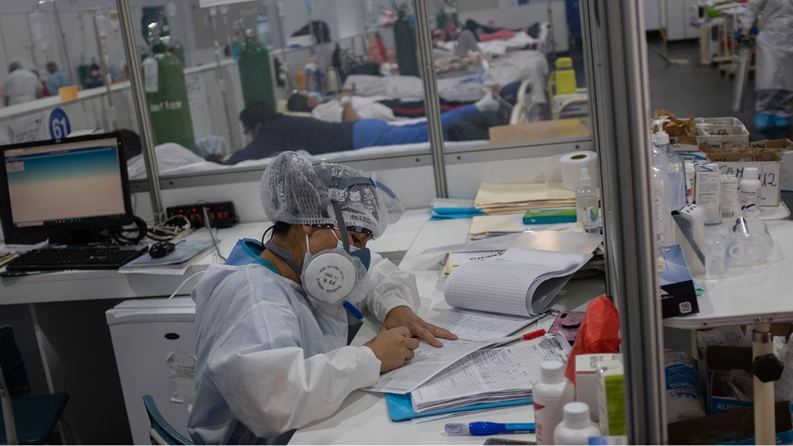Medical personnel tend patients at a makeshift ward constructed for Covid-19 patients at a school in the central city of Huanuco, 370 kilometres northeast of Lima on January 25, 2021.
