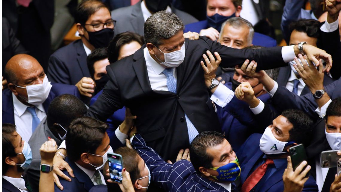 Brazilian Deputy Arthur Lira (centre) is lifted as he celebrates after being elected as president of Brazil's Lower House in Brasilia on February 1, 2021. Brazil's Congress on Monday elected Rodrigo Pacheco and Arthur Lira as Senate and Lower House's speakers respectively, both allies of far-right President Jair Bolsonaro. 