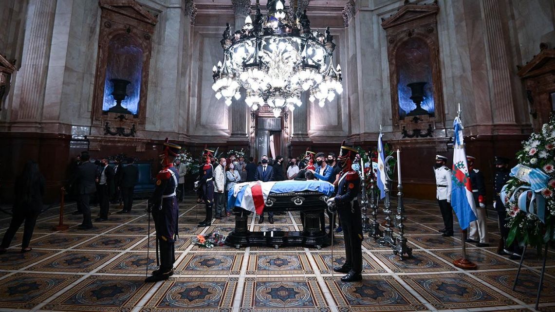 Carlos Menem's body lies in state at Congress.