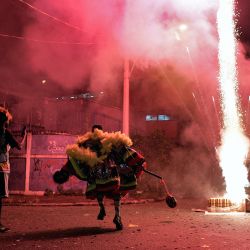 Los miembros del grupo tradicional  | Foto:Carl De Souza / AFP