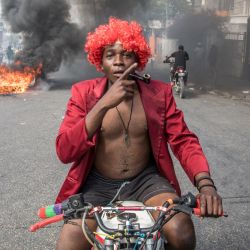 Los manifestantes marchan en Puerto Príncipe para protestar contra el gobierno del presidente Jovenel Moise. | Foto:Valerie Baeriswyl / AFP