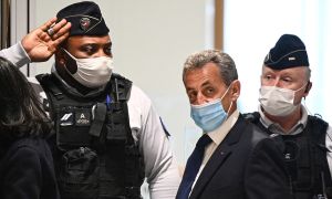 Former French president Nicolas Sarkozy arrives at the Paris court house to hear the final verdict in a corruption trial on March 1, 2021.