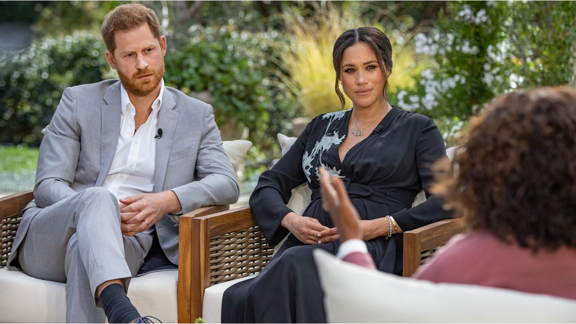 Britain's Prince Harry (L) and his wife Meghan (C), Duchess of Sussex, in a conversation with US television host Oprah Winfrey.