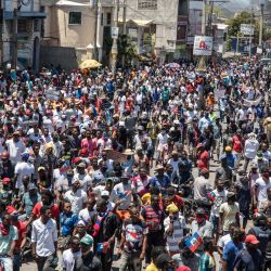 Los haitianos se manifiestan durante una protesta para denunciar el proyecto de referéndum constitucional llevado a cabo por el presidente Jovenel Moise en Puerto Príncipe. | Foto:Valerie Baeriswyl / AFP