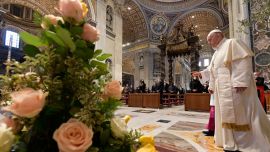 This photo taken and handout on April 4, 2021 by The Vatican Media shows Pope Francis arriving to deliver his Urbi et Orbi Blessing, after celebrating Easter Mass on April 04, 2021 at St. Peter's Basilica in The Vatican during the Covid-19 coronavirus pandemic.