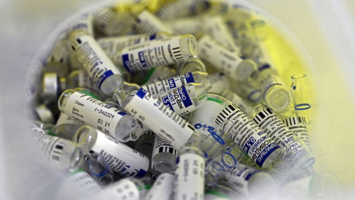 View of discared vials of the Russian Sputnik V and Chinese Sinopharm vaccines against Covid-19, at a vaccination centre at the Tecnopolis park in Villa Martelli, Buenos Aires Province, Argentina, on April 15, 2021.