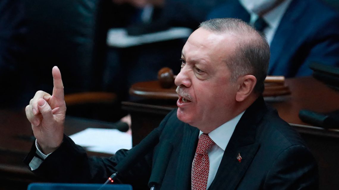 Turkish President and leader of Justice and Development (AK) Party Recep Tayyip Erdogan speaks during his ruling AK Party's group meeting at the Grand National Assembly of Turkey (GNAT), in Ankara, on April 21, 2021. 