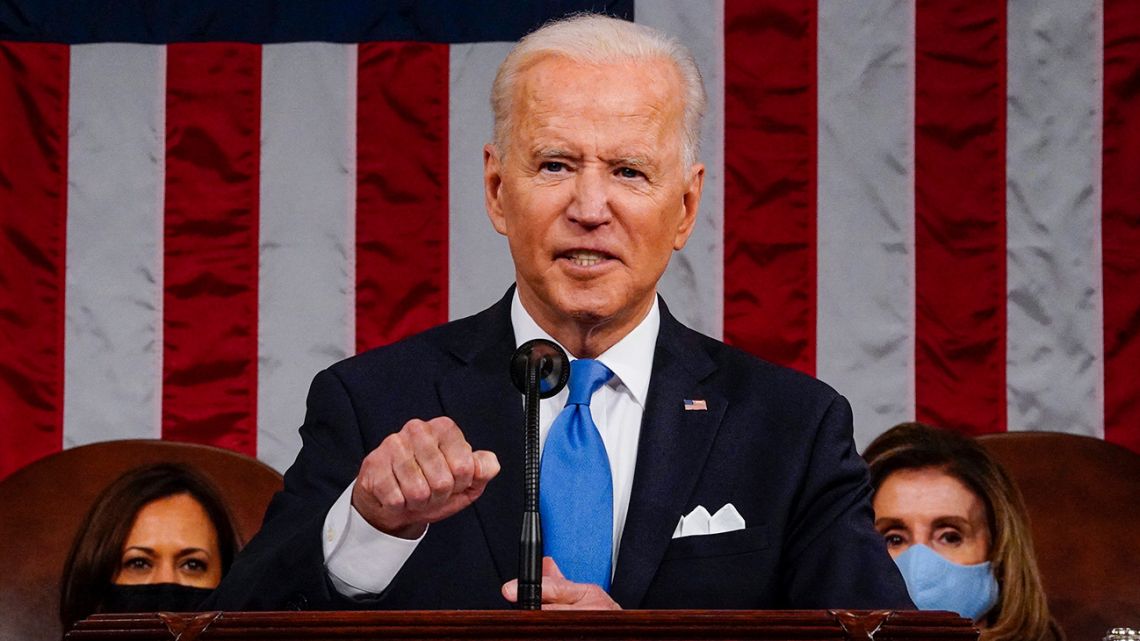 U.S. President Joe Biden addresses a joint session of Congress as Vice President Kamala Harris (L) and Speaker of the House U.S. Rep. Nancy Pelosi (D-CA) (R) look on in the House chamber of the U.S. Capitol April 28, 2021 in Washington, DC. 