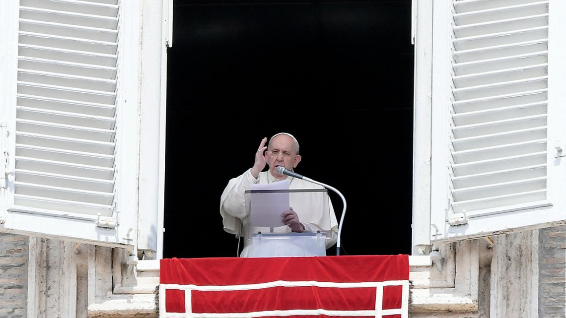 Pope Francis delivers his blessing from his studio's window overlooking Saint Peter's Square, at the Vatican, during the Sunday Angelus prayer on May 2, 2021.