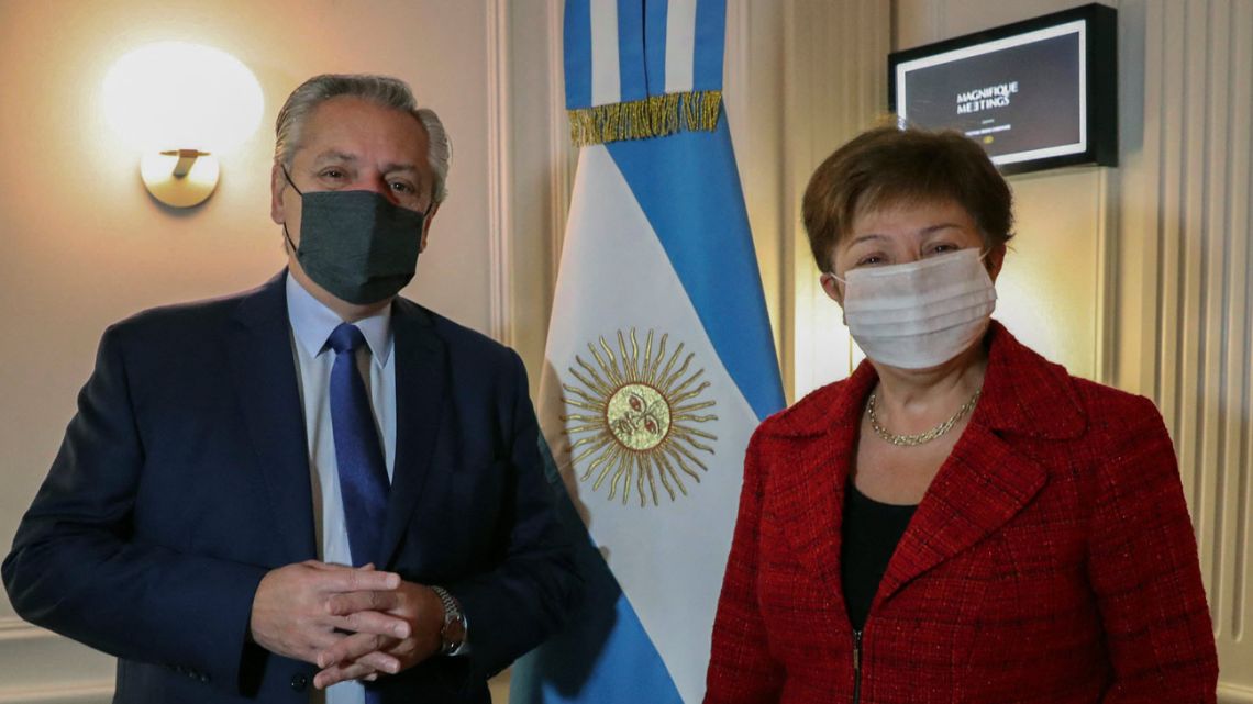 Handout photo released by Presidency on May 14, 2021 shows President Alberto Fernández and International Monetary Fund Managing Director Kristalina Georgieva posing for a photo after a meeting in Rome, Italy. 