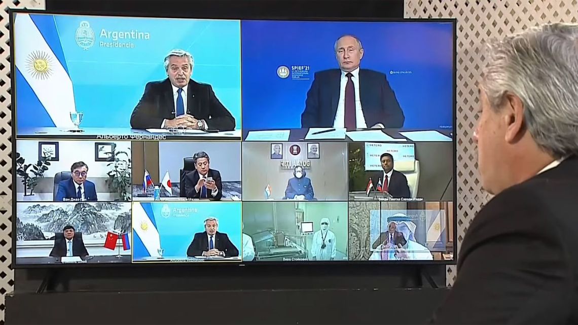 Russian President Vladimir Putin (left) and President Alberto Fernández share an online event announcing the production of the Sputnik V coronavirus vaccine in Argentina.