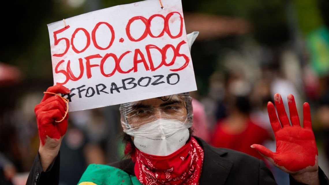 A demonstrator protests against Brazilian President Jair Bolsonaro's handling of the COVID-19 pandemic in Manaus, Brazil on June 19, 2021.