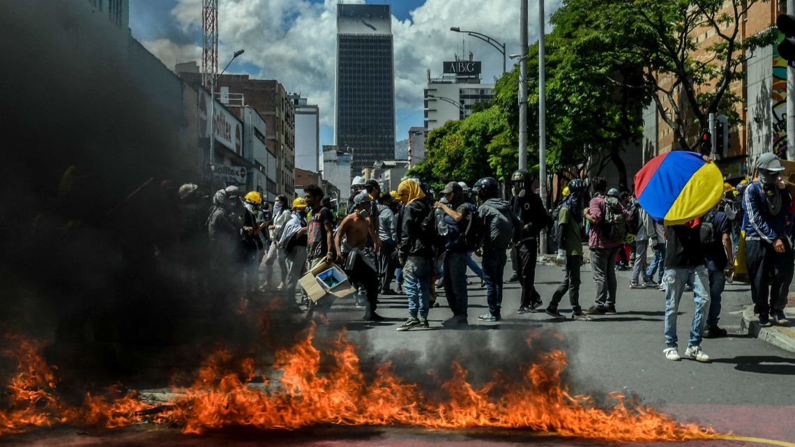 Demonstrators block a street during a protest against the government in Medellin, Colombia, on June 28, 2021.