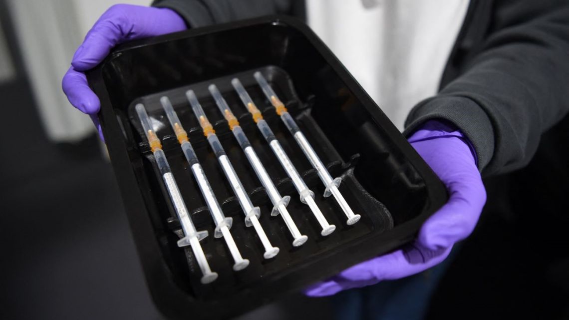 Syringes filled with the Pfizer BioNTech vaccine are pictured at the vaccination center of CHEMPARK operator CURRENTA in Leverkusen, western Germany, on June 22, 2021.