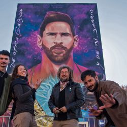Images of a giant mural depicting Lionel Messi in Rosario, Santa Fe Province, Argentina. The mural, located in front of the school which Messi attended as a child, is the work of local artists Fer Lerena, Massi Ledesma, Lisandro Urteaga and Marlen Zuriaga.