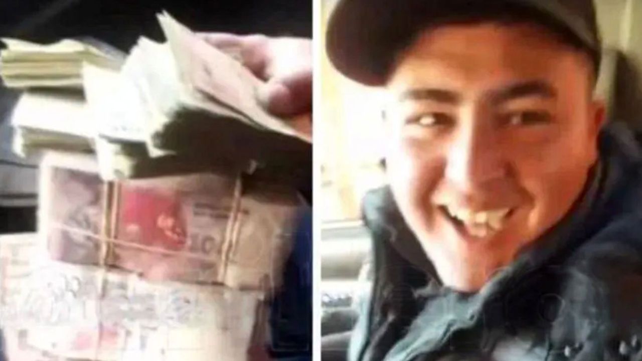 Uno de los delincuentes y el dinero robado | Foto:captura de video