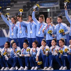 Las Leonas, Argentina's silver medallists, pose on the podium during the medal ceremony of the Tokyo 2020 Olympic Games women's field hockey competition, at the Oi Hockey Stadium, on August 6, 2021. 