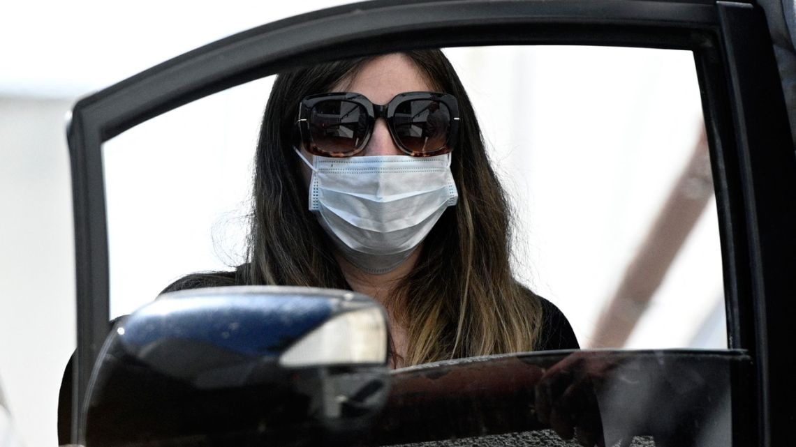 In this file photo taken on November 6, 2020, Dalma Maradona, daughter of Diego Maradona, leaves the private clinic where he underwent a brain surgery for a blood clot, in Olivos, Buenos Aires Province. 