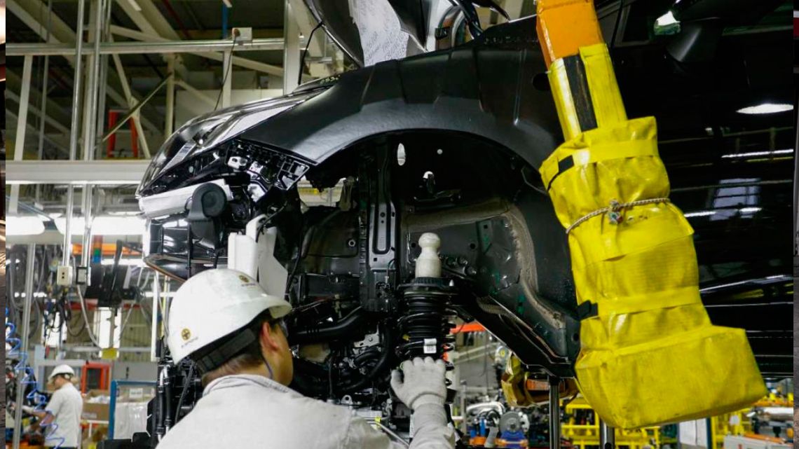 A worker at an automobile manufacturing plant.