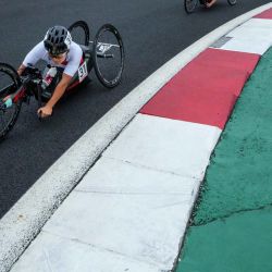 Esta foto muestra a la china Sun Bianbian compitiendo en la carrera de ciclismo en ruta H5 femenina durante los Juegos Paralímpicos de Tokio 2020 en el Fuji International Speedway en Oyama. | Foto:Thomas Lovelock / OIS/IOC / AFP