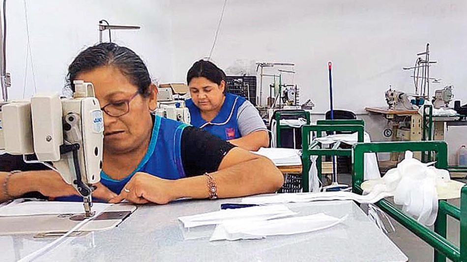 20210904_trabajadora_industria_textil_telam_g