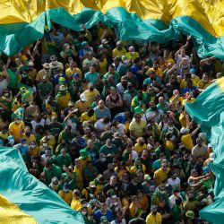 La gente participa en una manifestación en apoyo del presidente brasileño Jair Bolsonaro en Sao Paulo. | Foto:Miguel Schincariol / AFP