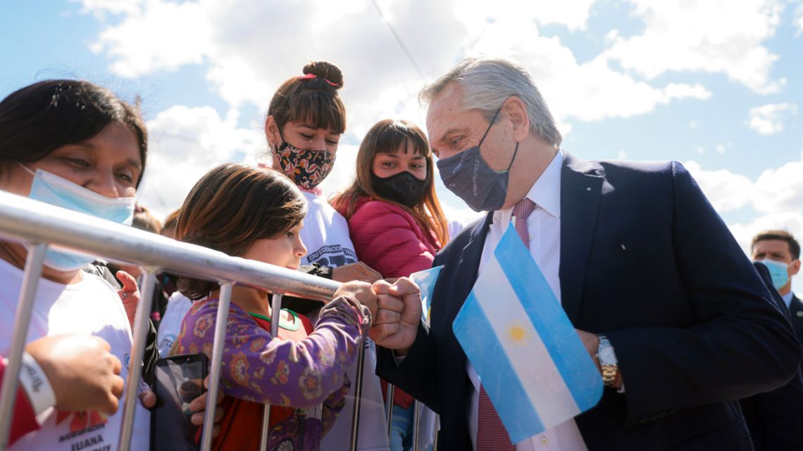 President Alberto Fernández greets children at an event in Almirante Brown, Buenos Aires Province.