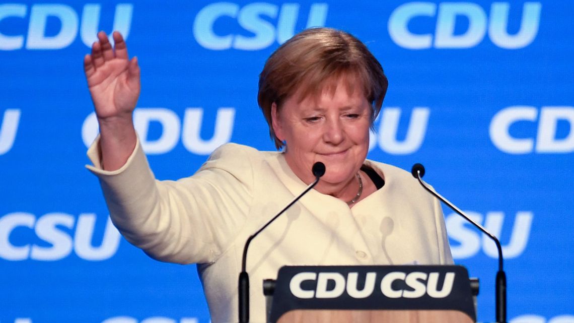 German Chancellor Angela Merkel waves after addressing the last rally of the conservative Christian Democratic Union CDU and its Bavarian sister-party Christian Social Union CSU in Munich, southern Germany, on September 24, 2021, ahead of the German federal election on September 26. 