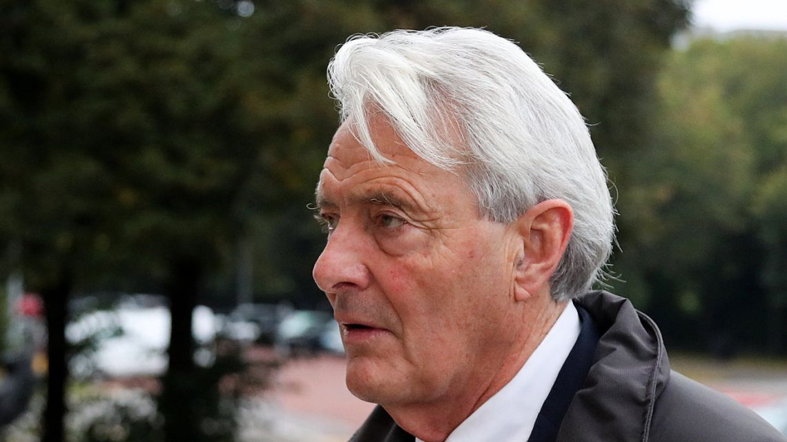 David Henderson arrives at the Cardiff Crown Court on October 18, 2021 to be tried in connection with the plane crash that killed footballer Emiliano Sala. Henderson was charged last year for endangering the safety of an aircraft and attempting to discharge a passenger without valid permission or authorisation. Henderson, who denies the charges, is alleged to have arranged the flight to bring the former Nantes striker from France to Cardiff, where he was due to begin training with the Welsh club, which was then in the Premier League. The plane crashed into the sea near the Channel island of Guernsey, killing Sala, 28, and its pilot. 