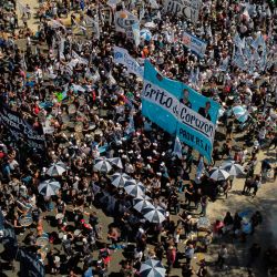 In this aerial view, workers called by unions take part in a rally to celebrate Peronist Loyalty Day in Buenos Aires on October 18, 2021.
