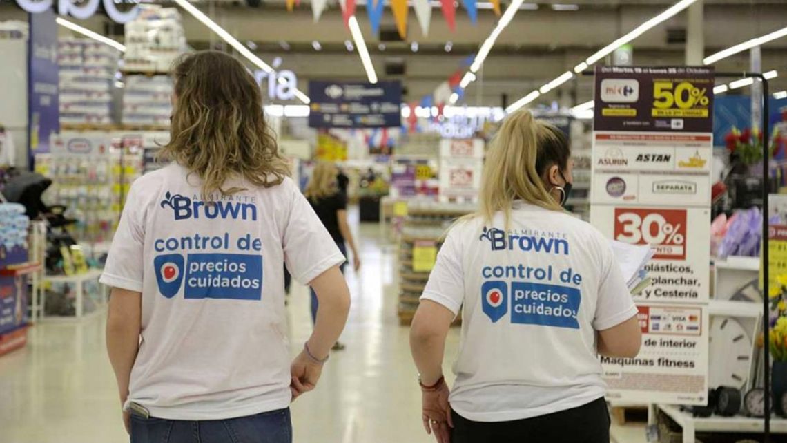 Price-checkers for the 'Precios Cuidados' price control scheme visit a supermarket in Almirante Brown, Buenos Aires Province.