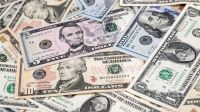 Hong Kong Dollar, Chinese Yuan and US Dollar Banknotes As Currency Peg Intervention From HKMA Continues Into Third Day