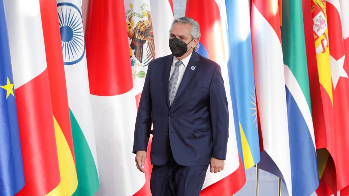 Handout picture released by the Presidency shows President Alberto Fernández walking to meet Italy's Prime Minister, Mario Draghi (out of frame), during the welcoming of leaders for the G20 of World Leaders Summit on October 30, 2021 at the convention centre "La Nuvola" in the EUR district of Rome. 