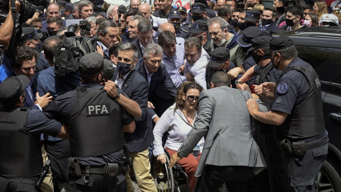 Former president Mauricio Macri and former vice-president Gabriela Michetti arrive at the federal courthouse in Dolores, Buenos Aires Province, on November 3, 2021. 