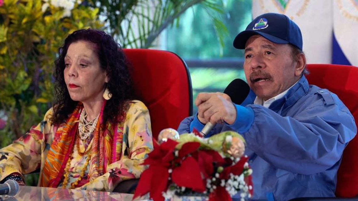 Handout picture released by Nicaragua's Presidency shows Daniel Ortega speaking next to his wife Rosario Murillo in Managua, Nicaragua on November 7, 2021.
