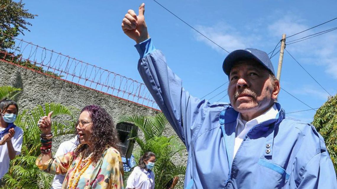 Nicaragua's President and presidential candidate Daniel Ortega and his wife and Vice-president Rosario Murillo give their thumbs up after casting their vote during the general election, in Managua, Nicaragua on November 7, 2021. 