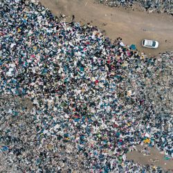 Aerial view of used clothes discarded in the Atacama desert, in Alto Hospicio, Iquique, Chile, on September 26, 2021. 