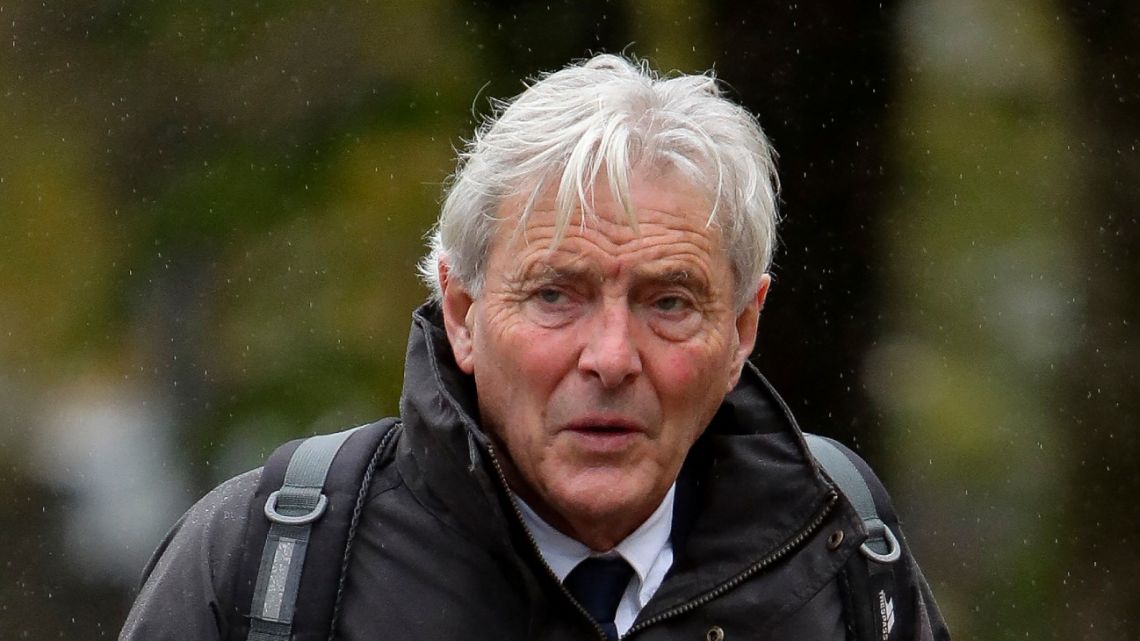 David Henderson arrives at the Cardiff Crown Court on November 12, 2021 to be sentenced in connection with the plane crash that killed footballer Emiliano Sala. Henderson, 67, who organised the 2019 flight that crashed, killing Sala, was found guilty last month of endangering the safety of an aircraft.