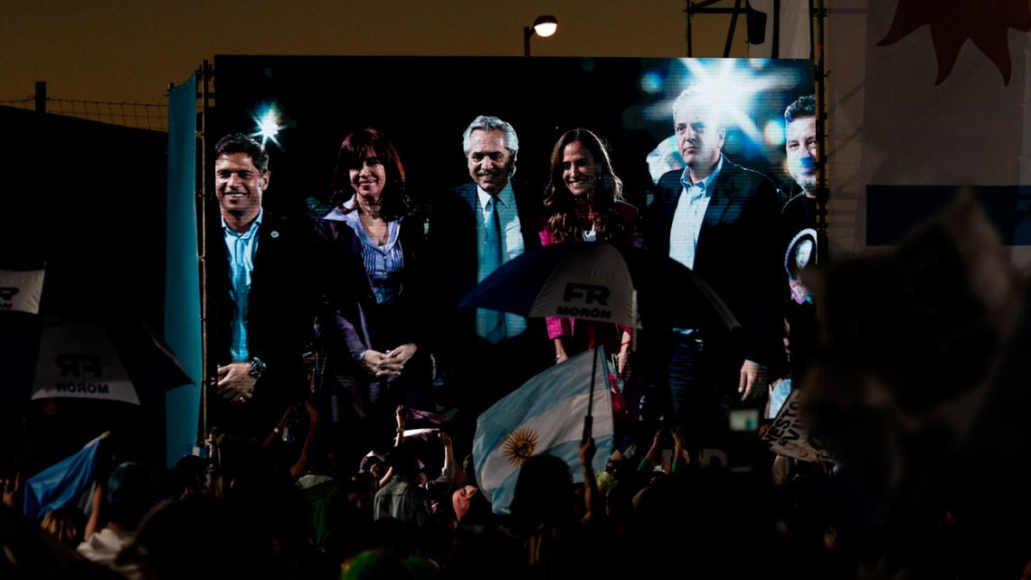 Key members of the ruling Frente de Todos coalition are shown on a screen at a Election 2021 campaign rally in November 2021.