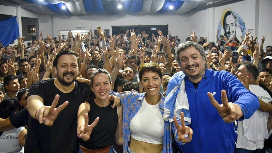 Quilmes Mayor Mayra Mendoza celebrates election night results onstage with other members of the Frente de Todos coalition, including lawmaker Máximo Kirchner. 