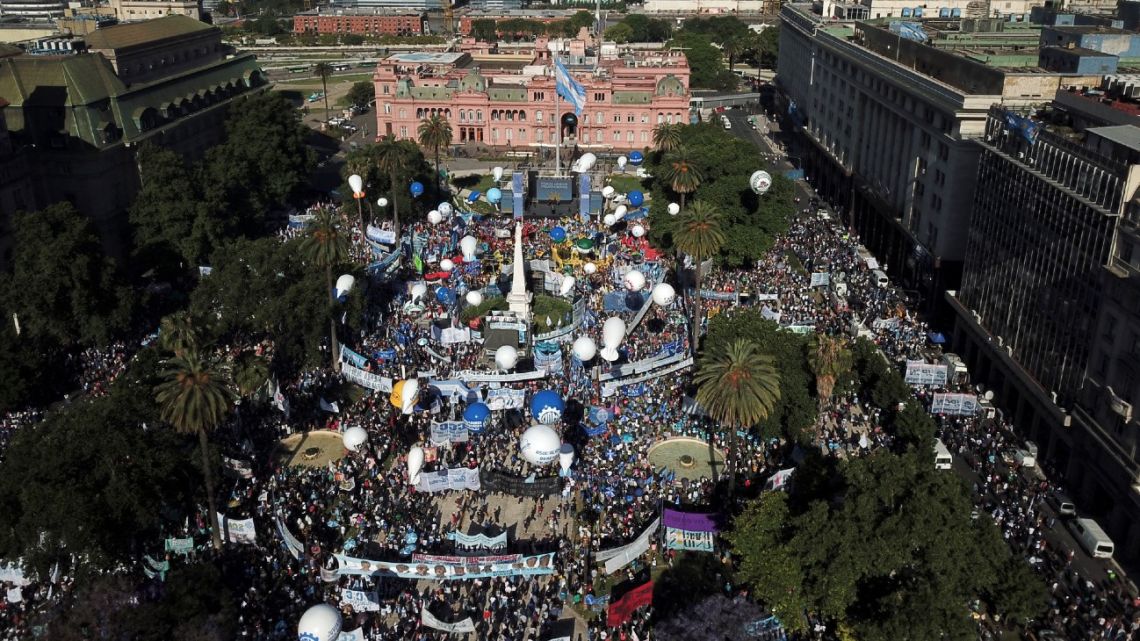 Aerial view of the Plaza de Mayo square and the Casa Rosada showing supporters of the ruling Frente de Todos coalition on November 17, 2021 to celebrate the ‘Dia de la Militancia’ and support Argentina's President Alberto Fernandez after his governing coalition lost control of Congress in last Sunday's midterm parliamentary elections.