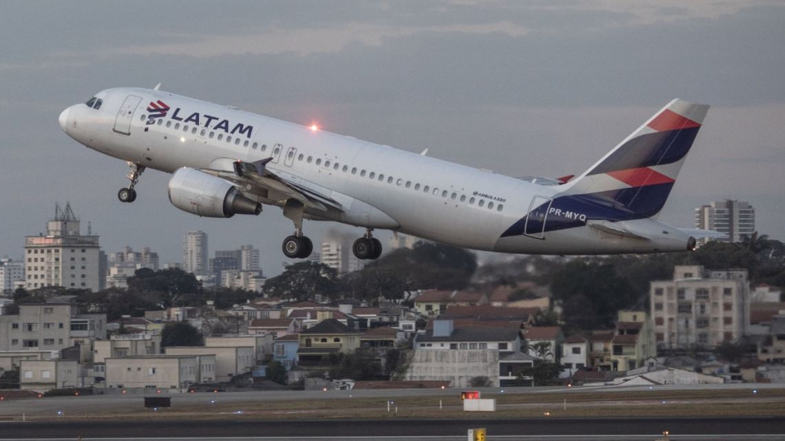 An aircraft operated by Latam Airlines Group SA sit takes off from Congonhas Airport (CGH) in São Paulo, Brazil, on Monday, August 9, 2021.