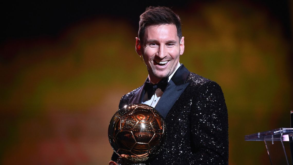 Lionel Messi reacts after being awarded the the Ballon d'Or award during the 2021 Ballon d'Or France Football award ceremony at the Theatre du Chatelet in Paris on November 29, 2021. 