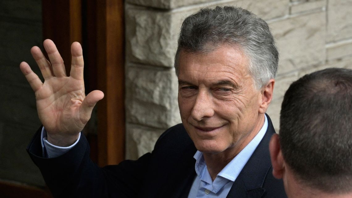In this photo taken on November 3, 2021, former president Mauricio Macri waves as he arrives at a federal court in Dolores, Buenos Aires Province. 