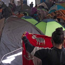 Los migrantes permanecen en el albergue Juventud 2000 en Tijuana, estado de Baja California, México. Estados Unidos reimplementó el programa Protocolo de Protección al Migrante (MPP), también conocido como “Permanecer en México”, luego de unamandato judicial.Guillermo Arias  | Foto:AFP