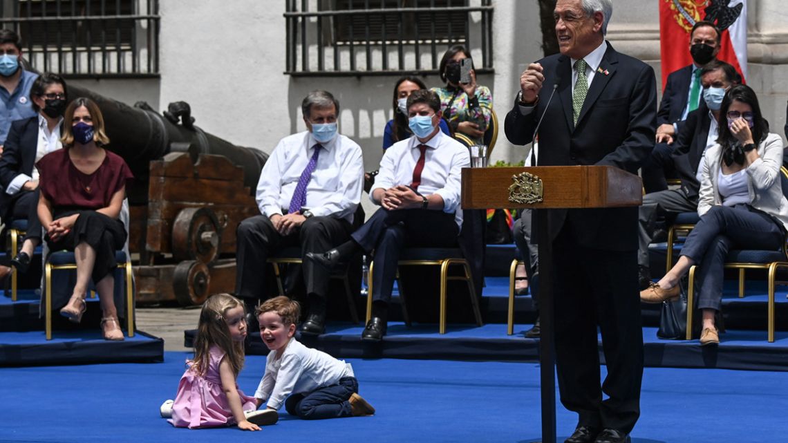 Chilean President Sebastián Piñera speaks during the signing of a law legalising same-sex marriage in Chile, at La Moneda Palace in Santiago on December 9, 2021. 