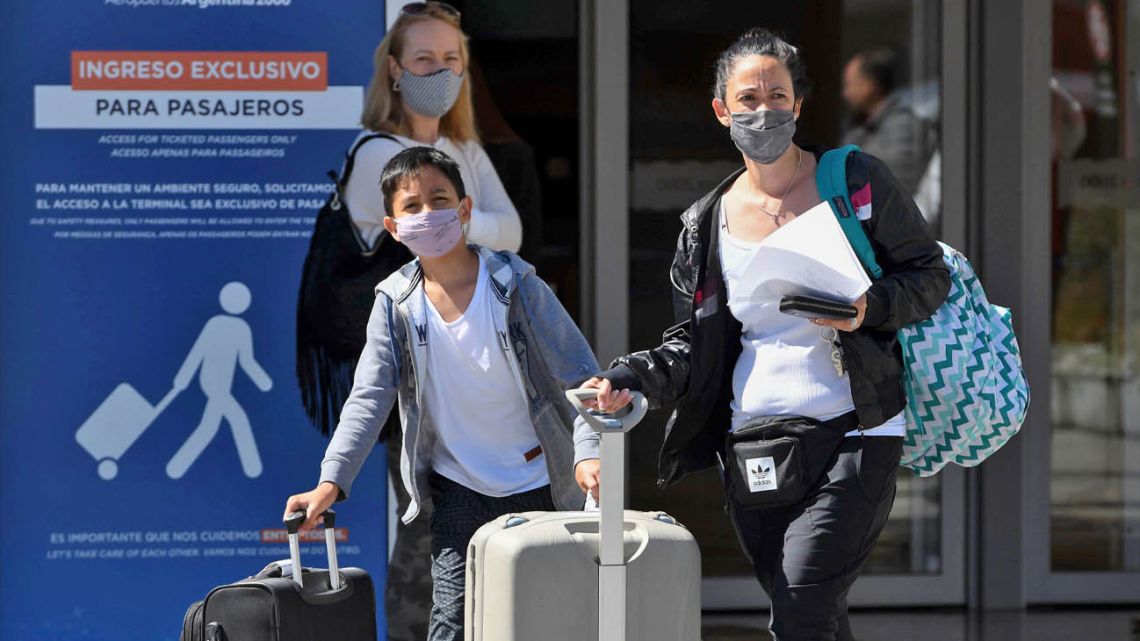 Travellers arrive at Ezeiza International Airport (EZE) during the coronavirus pandemic.